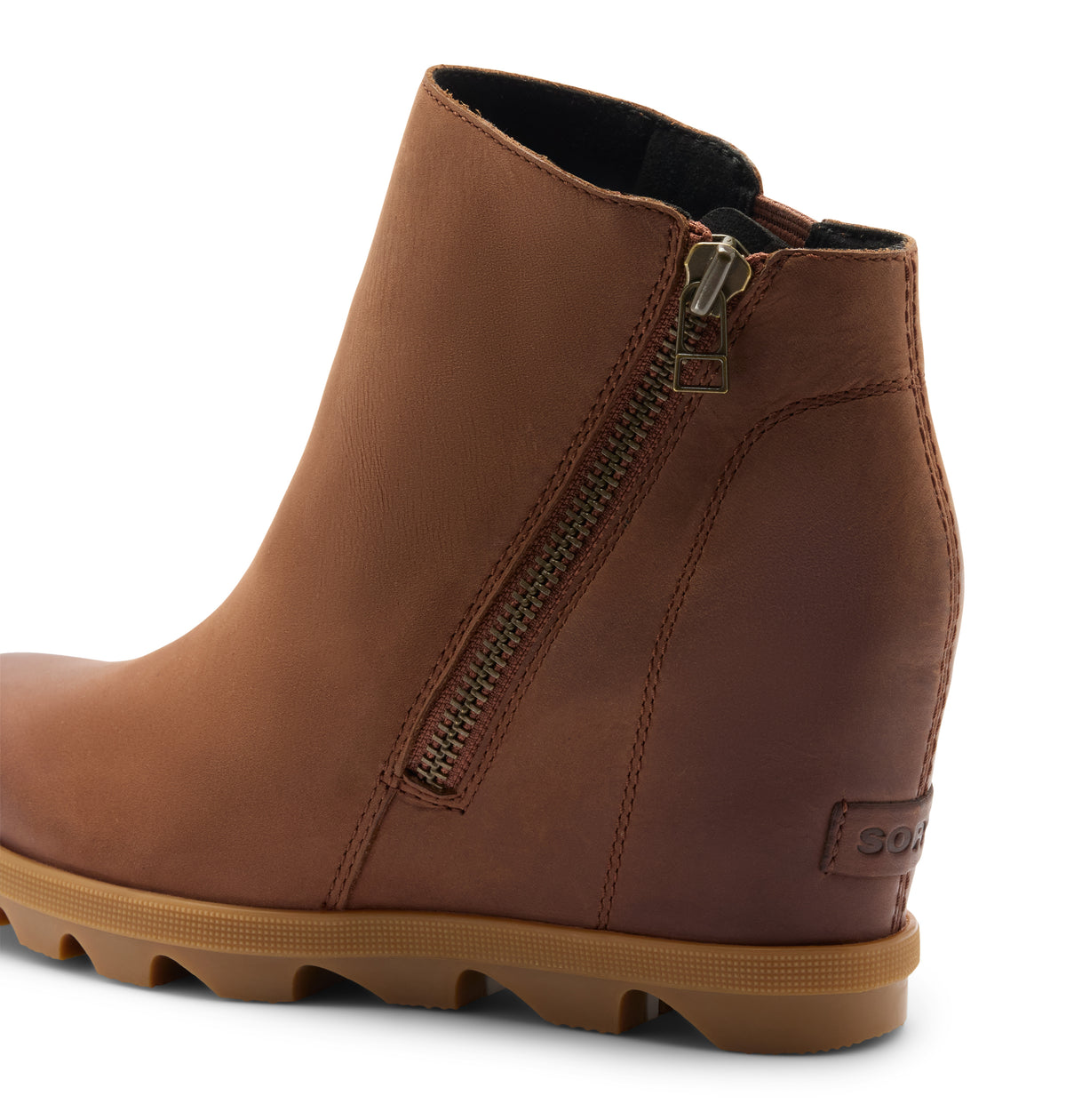 A brown leather ankle boot with a side zipper, wedge heel, and a thick lug sole, shown from a three-quarters angle on a white background.