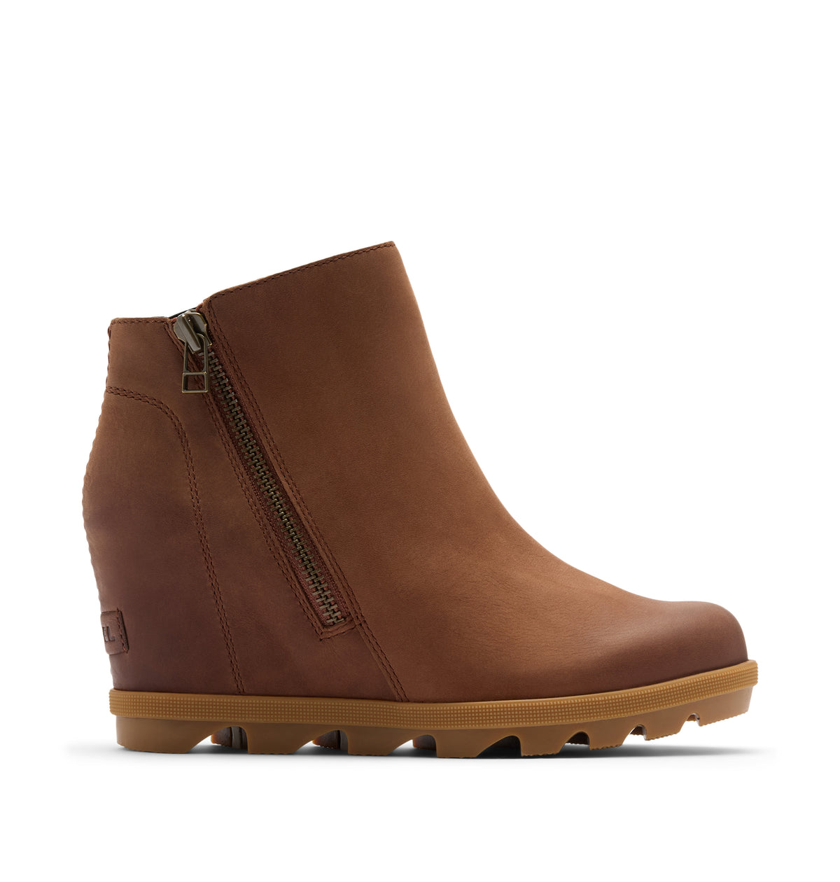 A brown suede ankle boot with a side zipper, wedge heel, and a thick brown lug sole, shown from a side profile on a white background.