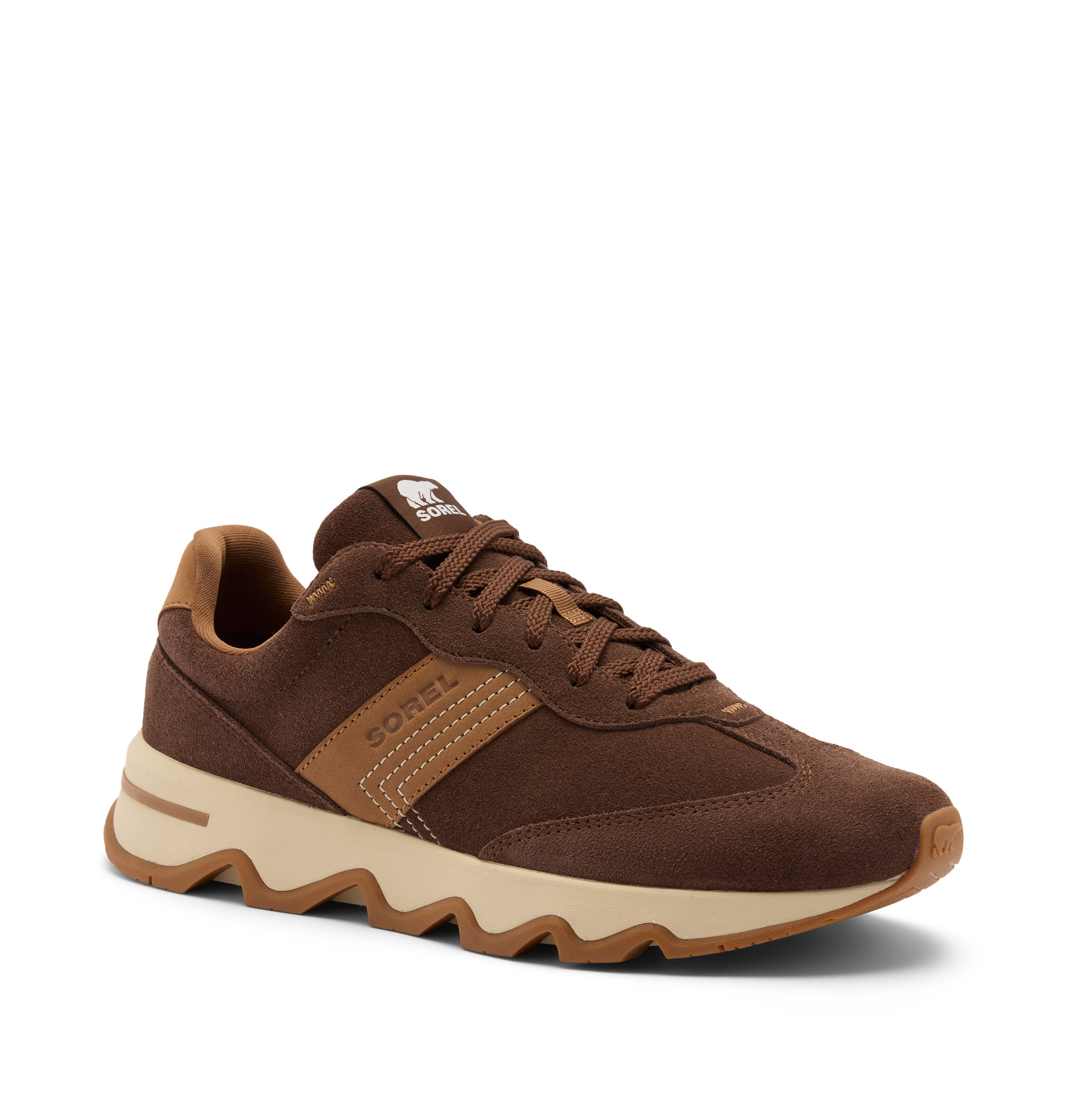 A brown suede and mesh athletic sneaker with a beige midsole and a brown wavy lug outsole, shown from a three-quarters angle on a white background.