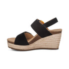 Black wedge sandal with espadrille sole on a white background
