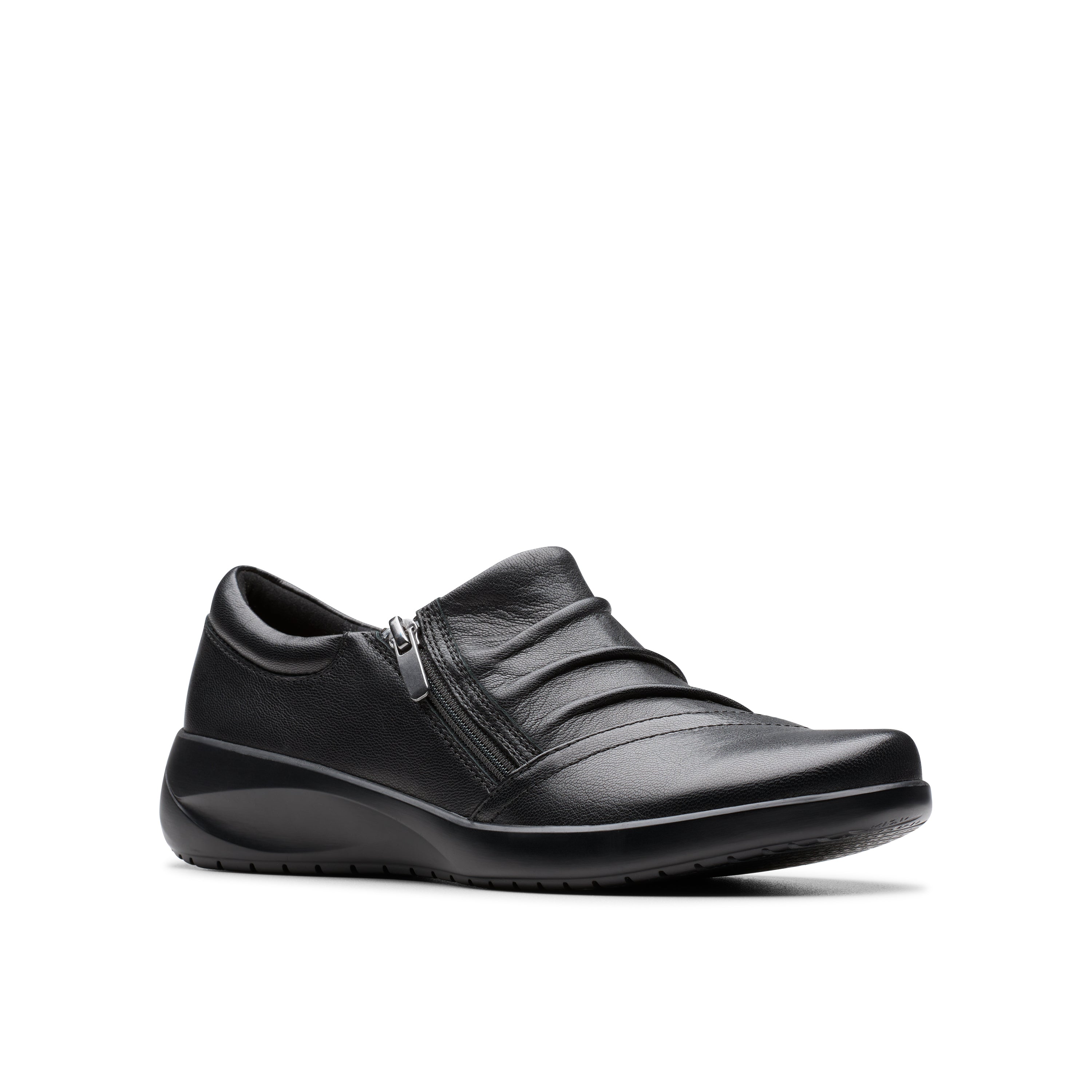 Black leather shoe on a white background