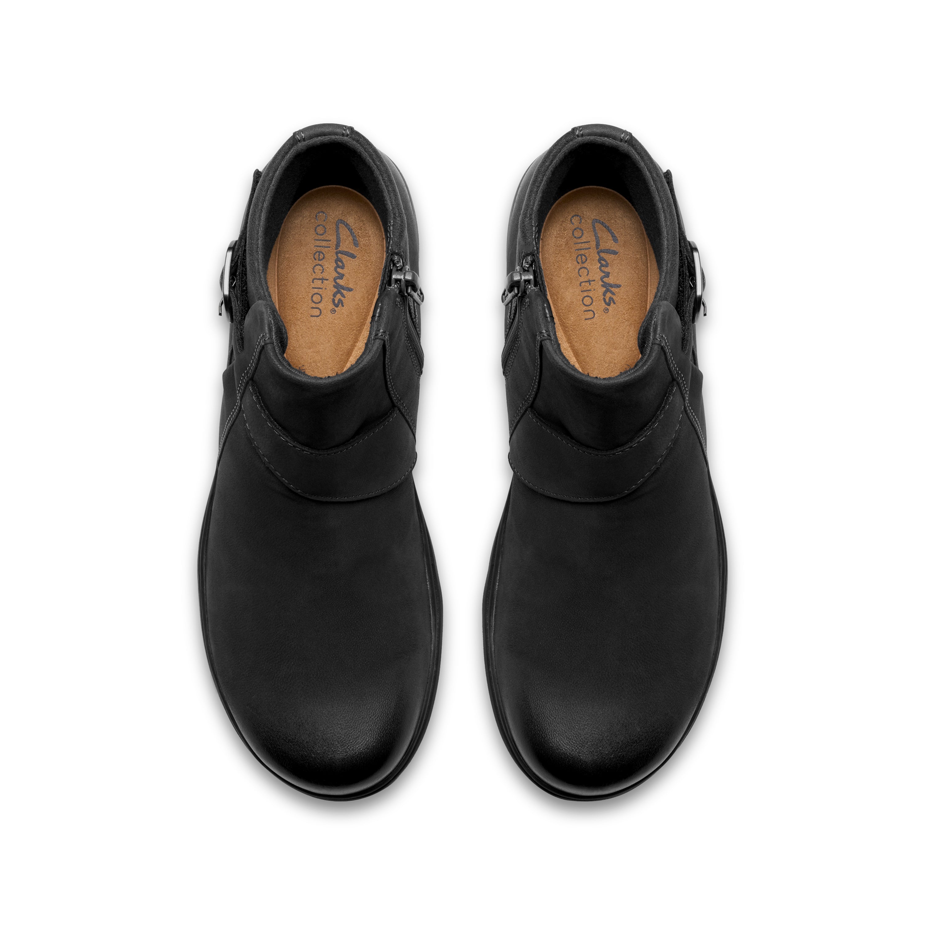 A pair of black leather ankle boots with side buckle straps, shown from a top-down view on a white background. The insoles show the brand 'Clarks Collection'.