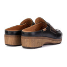 A pair of black leather clogs with chunky brown wooden platform soles, shown from a three-quarters angle on a white background.