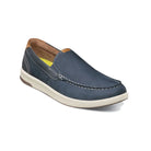 Blue loafer shoe on a white background