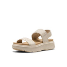 Beige sandal with a platform sole on a white background