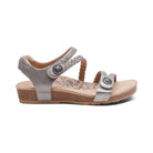 Silver sandal with a cork sole on a white background