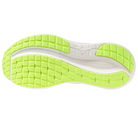 Close-up of a shoe sole with green and white design on a white background