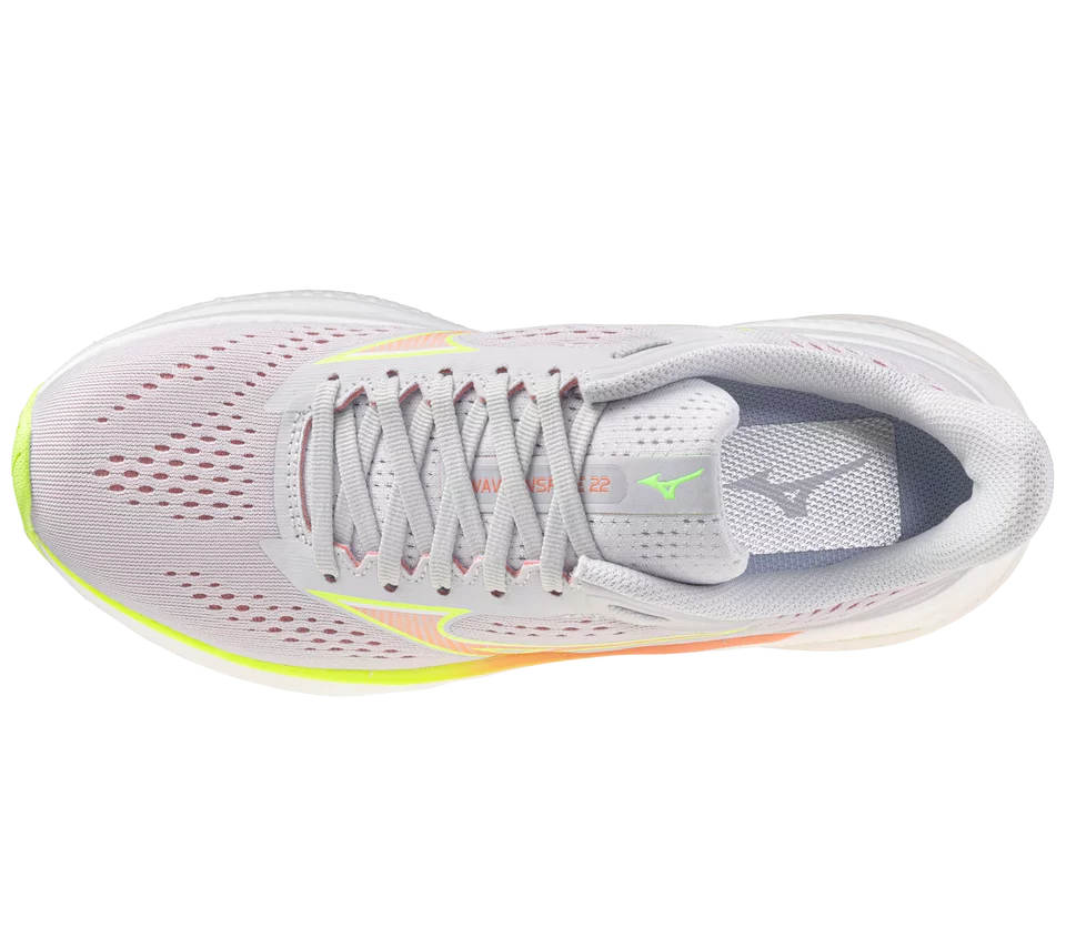 White running shoe with colorful accents on a white background