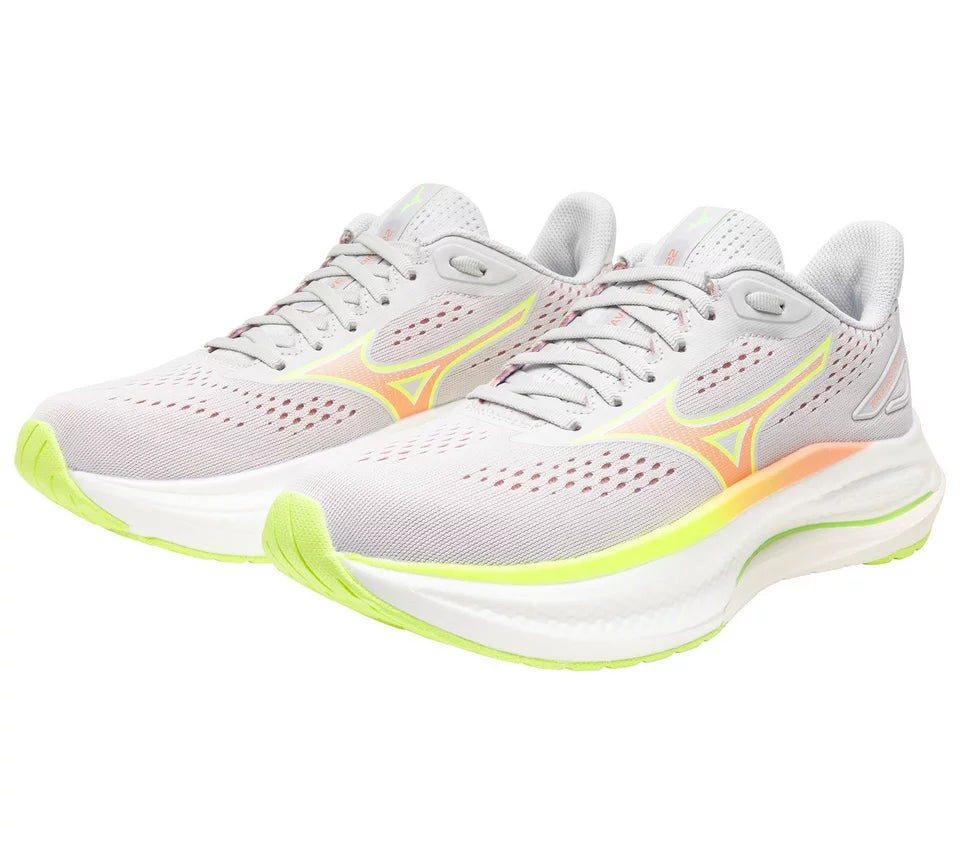 Pair of running shoes with a white and gray design on a white background