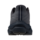 Black athletic shoe with 'Mizuno' branding on a white background