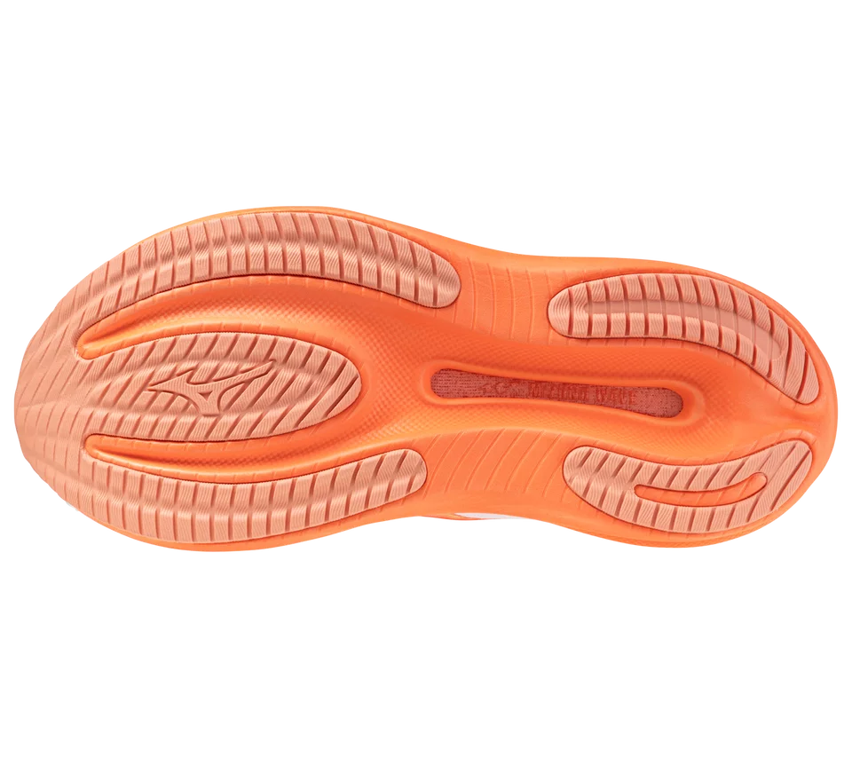 Close-up of an orange athletic shoe sole on a white background
