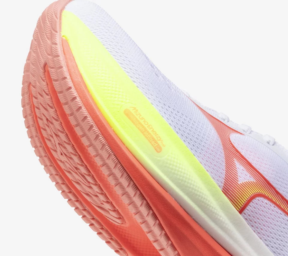 Close-up of a sports shoe with a brand logo on a white background
