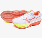 White running shoe with orange and yellow accents on a white background