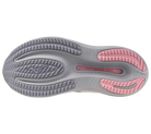 Gray and pink sole of a shoe on a white background