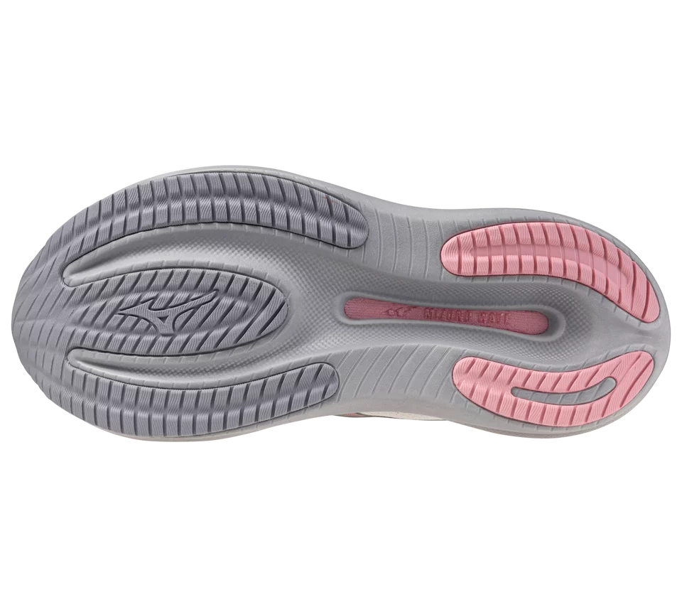 Gray and pink sole of a shoe on a white background