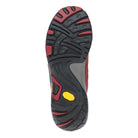 Close-up of a shoe sole with black and red tread pattern on a white background