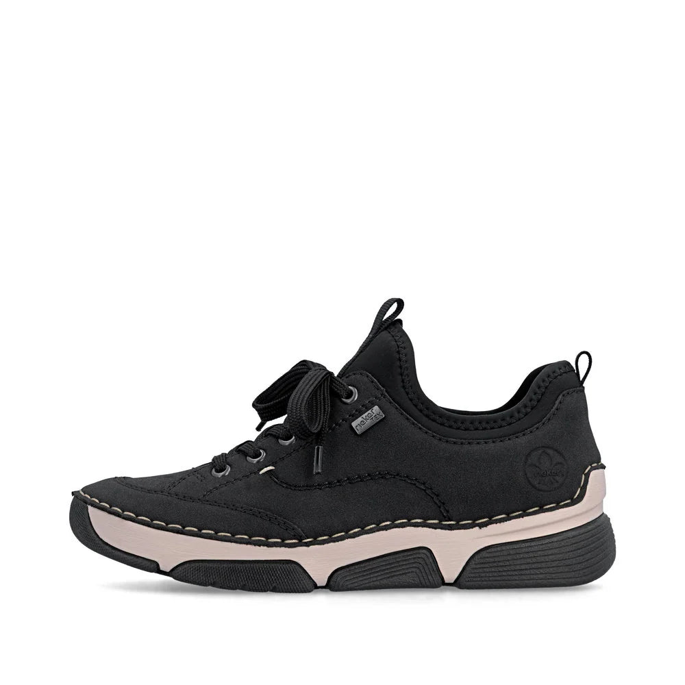 Black sneaker with pink sole on a white background