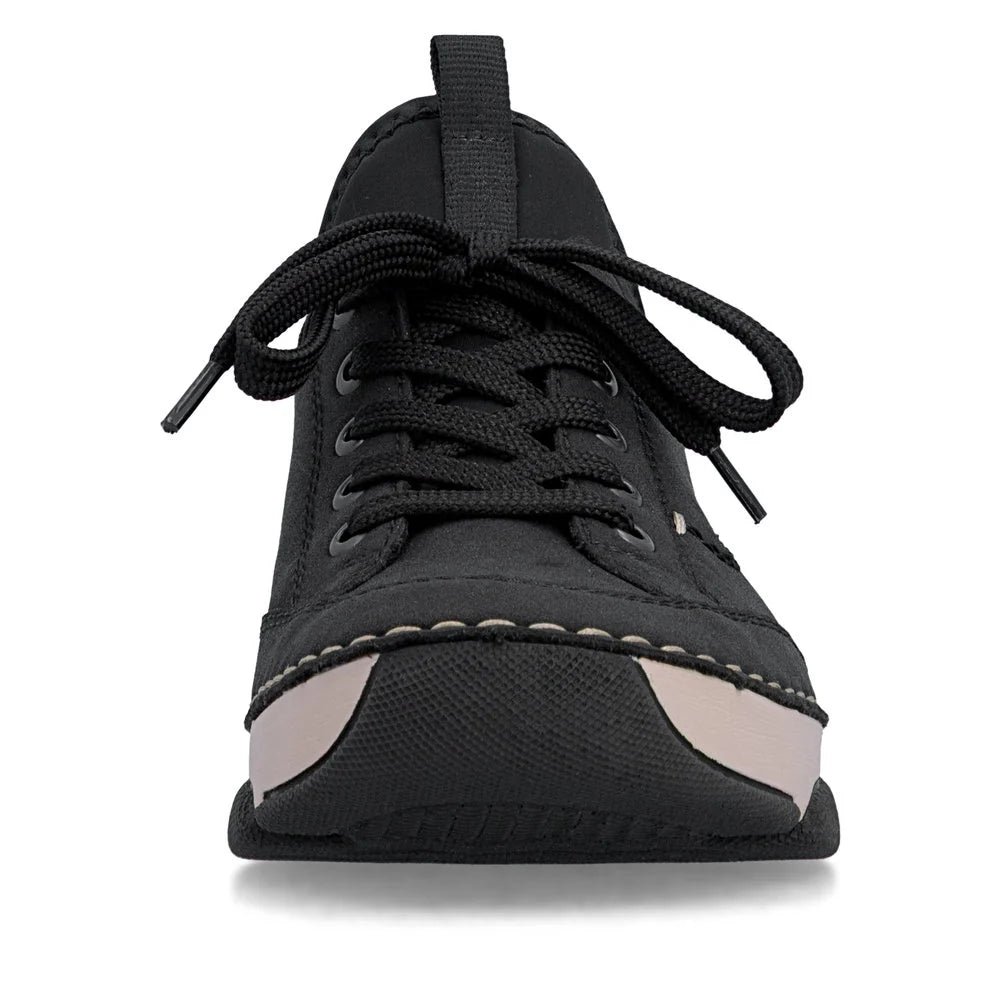 Black sneaker with beige accents on a white background