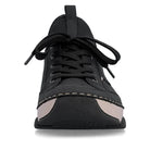 Black sneaker with beige accents on a white background