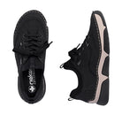 Black sneakers with beige accents on a white background