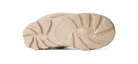 The beige sole of a UGG boot, showing the embossed UGG logo and textured tread pattern, photographed against a solid white background.
