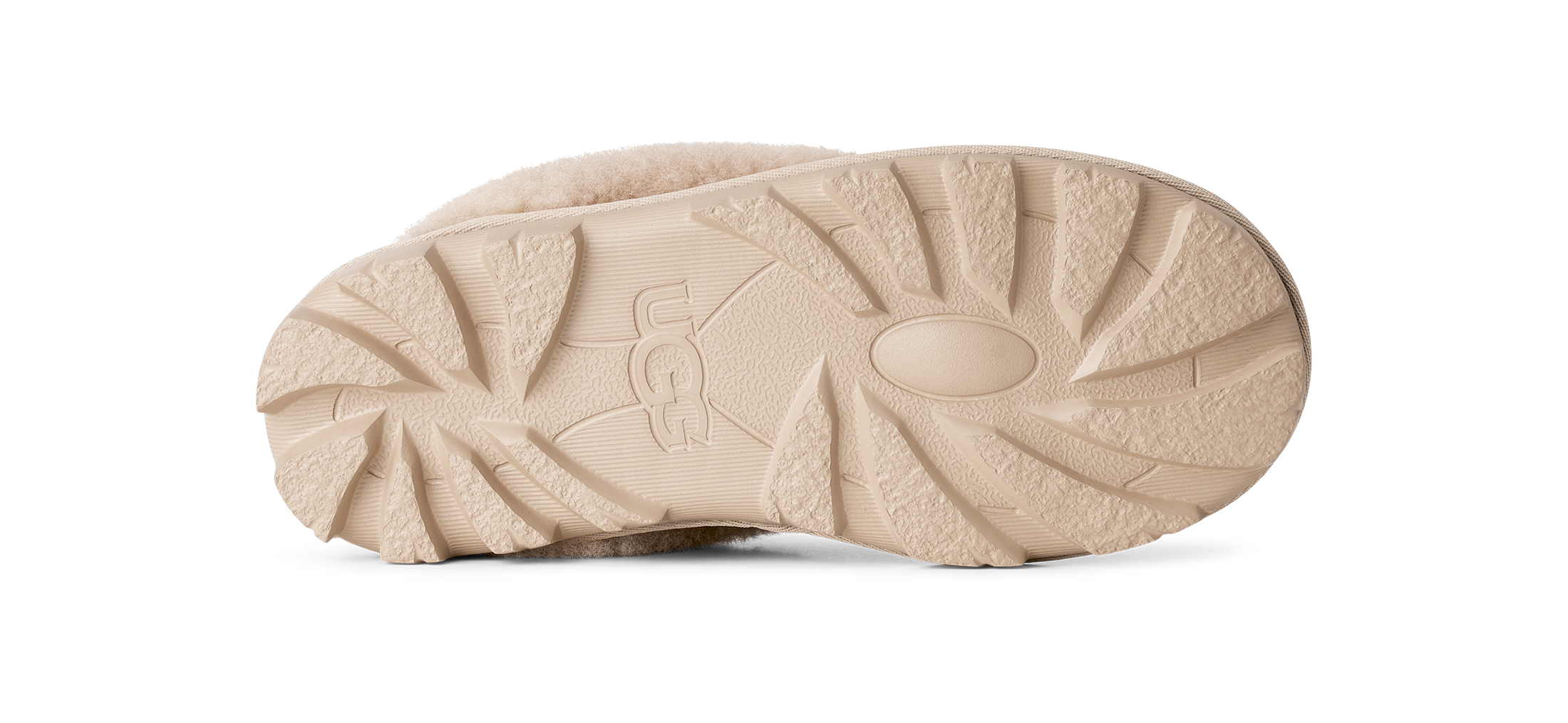 The beige sole of a UGG boot, showing the embossed UGG logo and textured tread pattern, photographed against a solid white background.