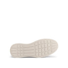White sneaker sole with brand logo on a white background