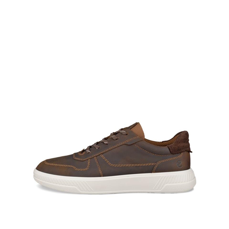 Black sneaker with white sole on a white background
