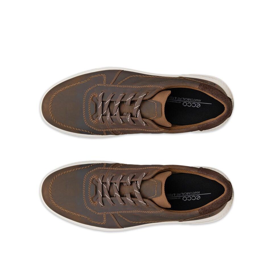 A pair of brown leather low-top sneakers shown from a top-down view on a solid white background. The shoes feature matching brown laces, contrast stitching, and a white rubber sole.