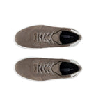 Pair of brown sneakers on a white background