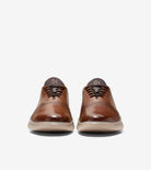 Pair of brown leather shoes on a white background