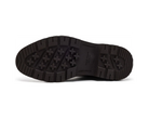 The black rubber outsole of a boot, showing a detailed tread pattern with cross-shaped lugs and the embossed brand name 'COLMAN'.