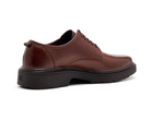 A brown leather lace-up shoe with a chunky black sole, shown from a side profile view on a white background.