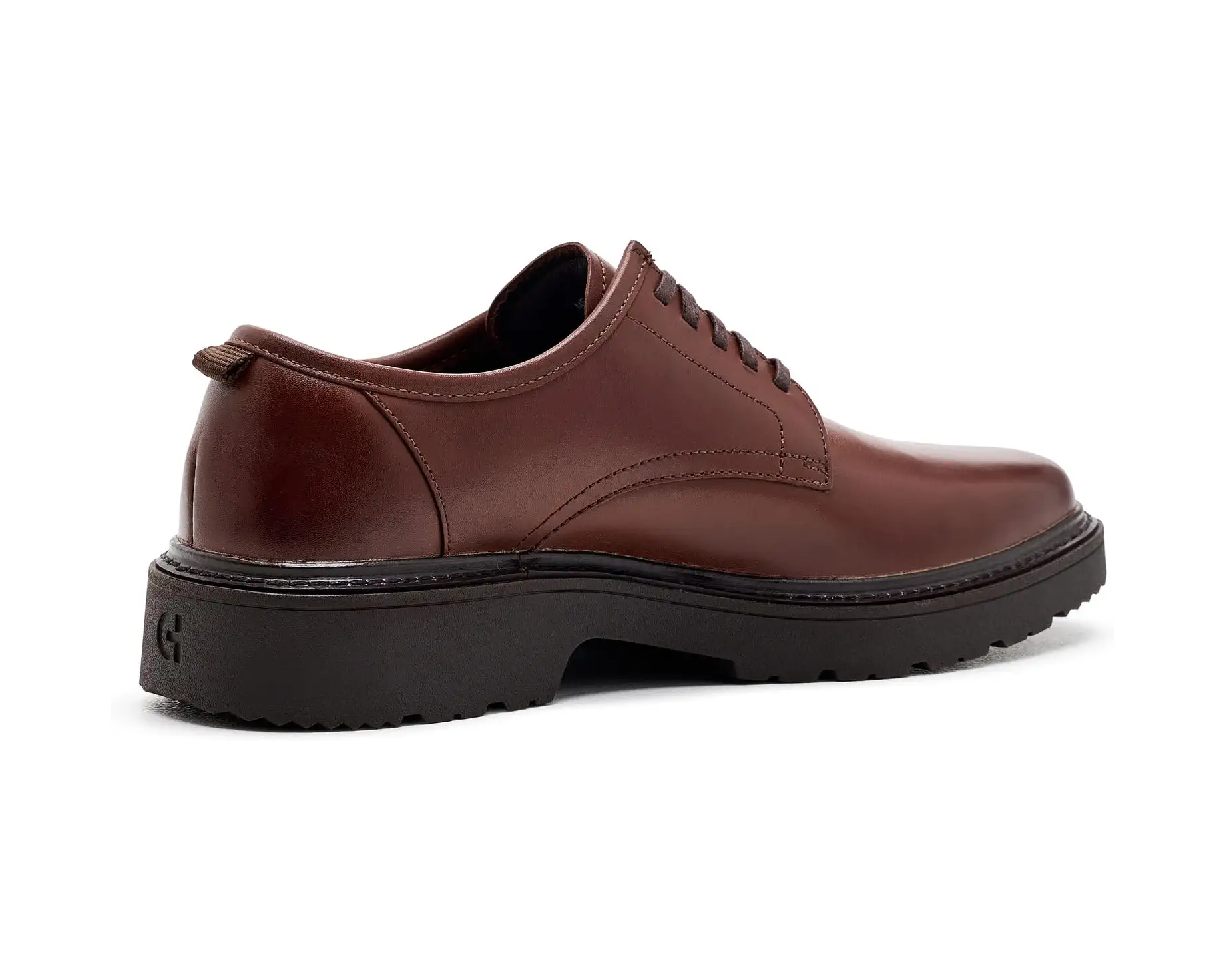 A brown leather lace-up shoe with a chunky black sole, shown from a side profile view on a white background.
