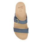 Blue sandal with a strap and buckle on a beige sole, featuring the Dansko logo.