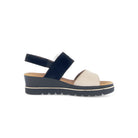 Navy and beige sandal on a white background