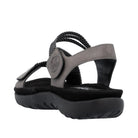 Black and gray sandal with a visible brand logo on a white background