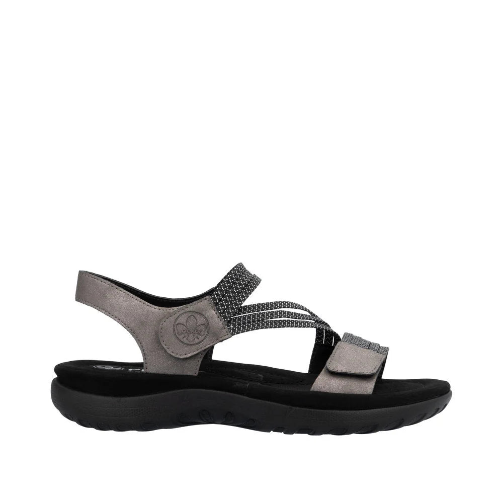 Gray sandal with black sole on a white background