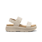 Beige sandal with platform sole on a white background