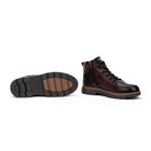 A pair of men's lace-up ankle boots in dark brown leather, shown from the side and sole on a clean white background.