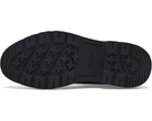 The black rubber outsole of a Cole haan shoe, showing the tread pattern and embossed brand name, photographed on a white background.