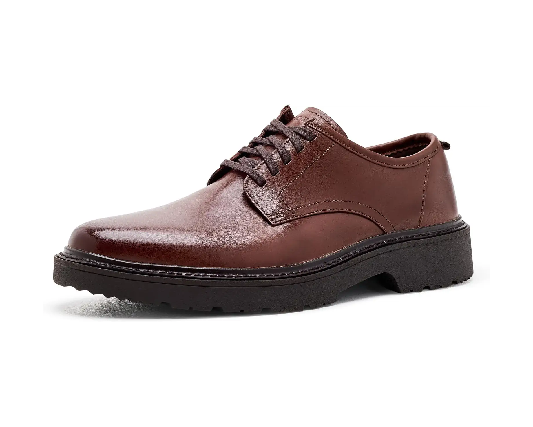A brown leather lace-up dress shoe with a chunky black sole, shown from a side profile on a white background.