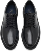 A pair of black leather lace-up dress shoes with a chunky black sole, shown from a top-down view on a white background.