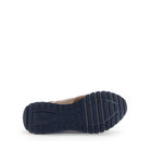 Navy blue sole of a shoe on a white background