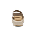 Beige sandal with a platform sole on a white background