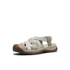 Beige sandal with multiple straps on a white background