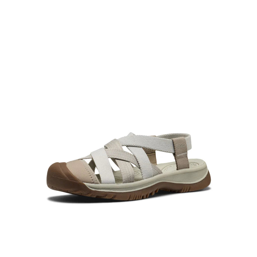 Beige sandal with multiple straps on a white background
