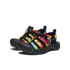 Colorful sandals with black soles on a white background