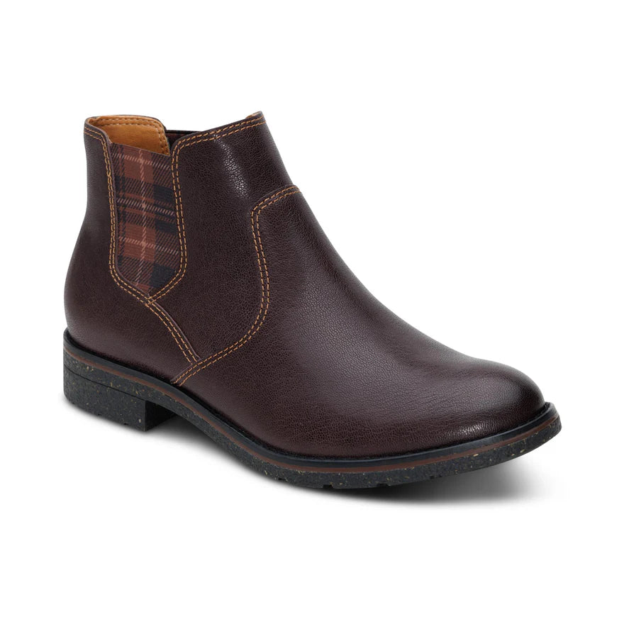 A dark brown leather ankle boot with contrast stitching and a brown and red plaid elastic side panel, shown from a three-quarters angle on a white background.
