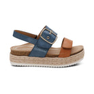 Blue and brown sandal with a buckle on a white background